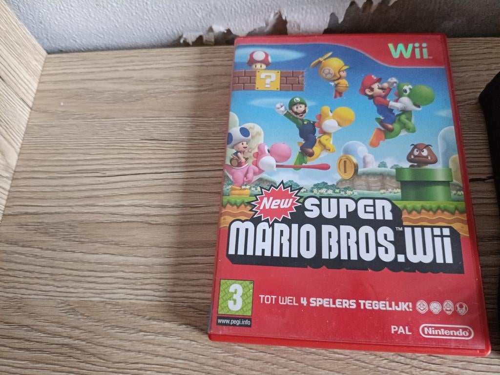 Nintendo Wii met New Super Mario Bros. Wii en accessoires, Gebruikt, Eén computer, Ophalen of Verzenden, Platform