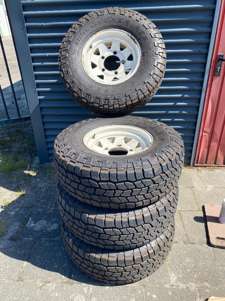 4 stuks 15 inch Cooper AT3 m+s 4x4 banden met velg, Ophalen, Gebruikt, 15 inch, 265 mm