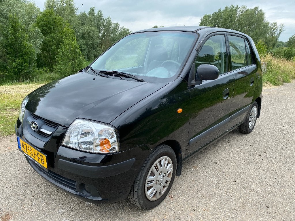 Hyundai Atos 1.1i ActiveYoung 2006, Auto's, Voorwielaandrijving, Stof, 31 €/maand, 4 cilinders