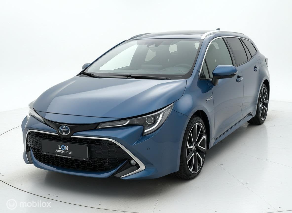 Toyota Corolla Touring Sports 2.0 Hybrid Premium PANO|JBL|CA, Auto's, Toyota, 1345 kg, Gebruikt, Zwart, Blauw