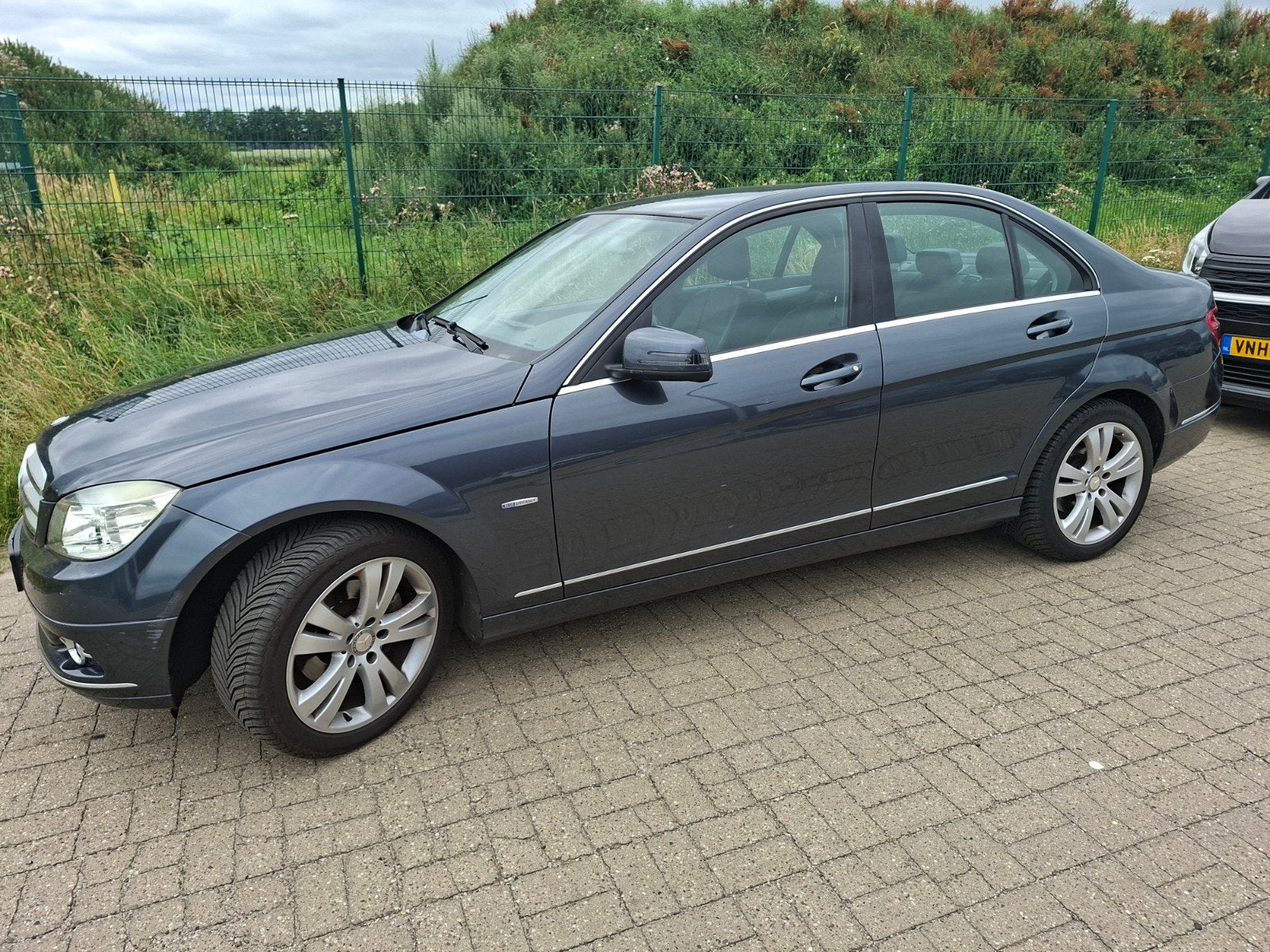 Mercedes-Benz C-Klasse 1.6 C180 Kompr. Sedan 2010 Grijs, 1380 kg, 14 km/l, Handgeschakeld, Sedan