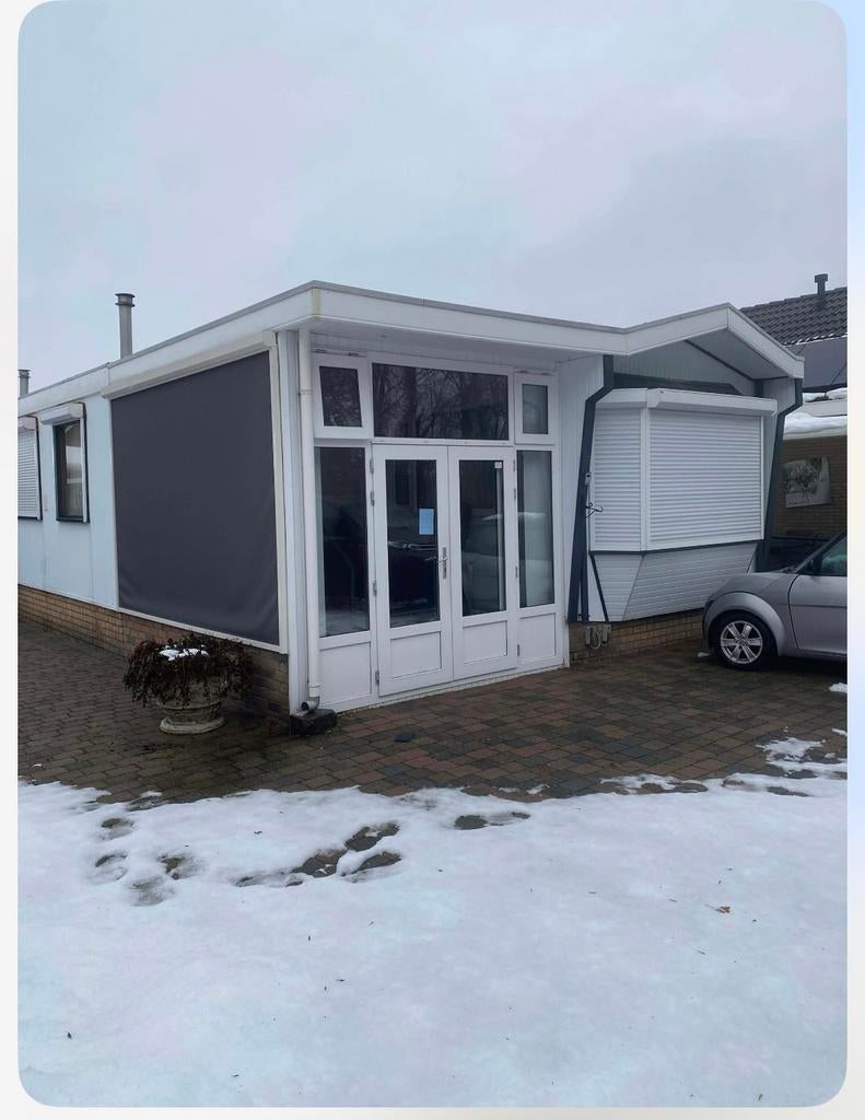 Te koop woonwagen met aanbouw