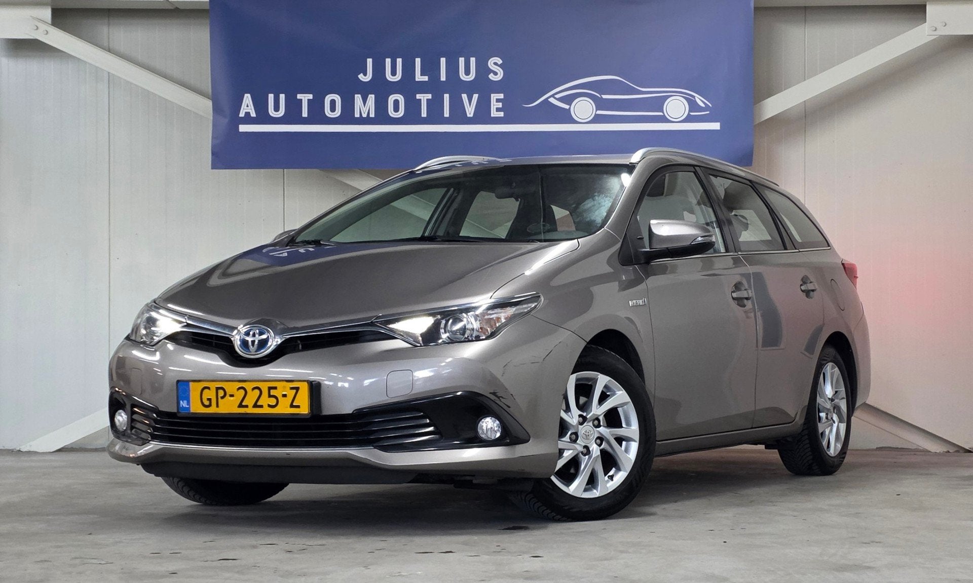 Toyota Auris Touring Sports 1.8 Hybrid Aspiration 2e Eigenaa, Auto's, Stof, Gebruikt, Euro 6, Bruin