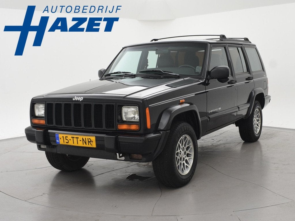 Jeep Cherokee 4.0i 4X4 AUT. LIMITED *APK 12-2026* Jeep Chero, Auto's, Automaat, Gebruikt, Stoelverwarming, Zwart