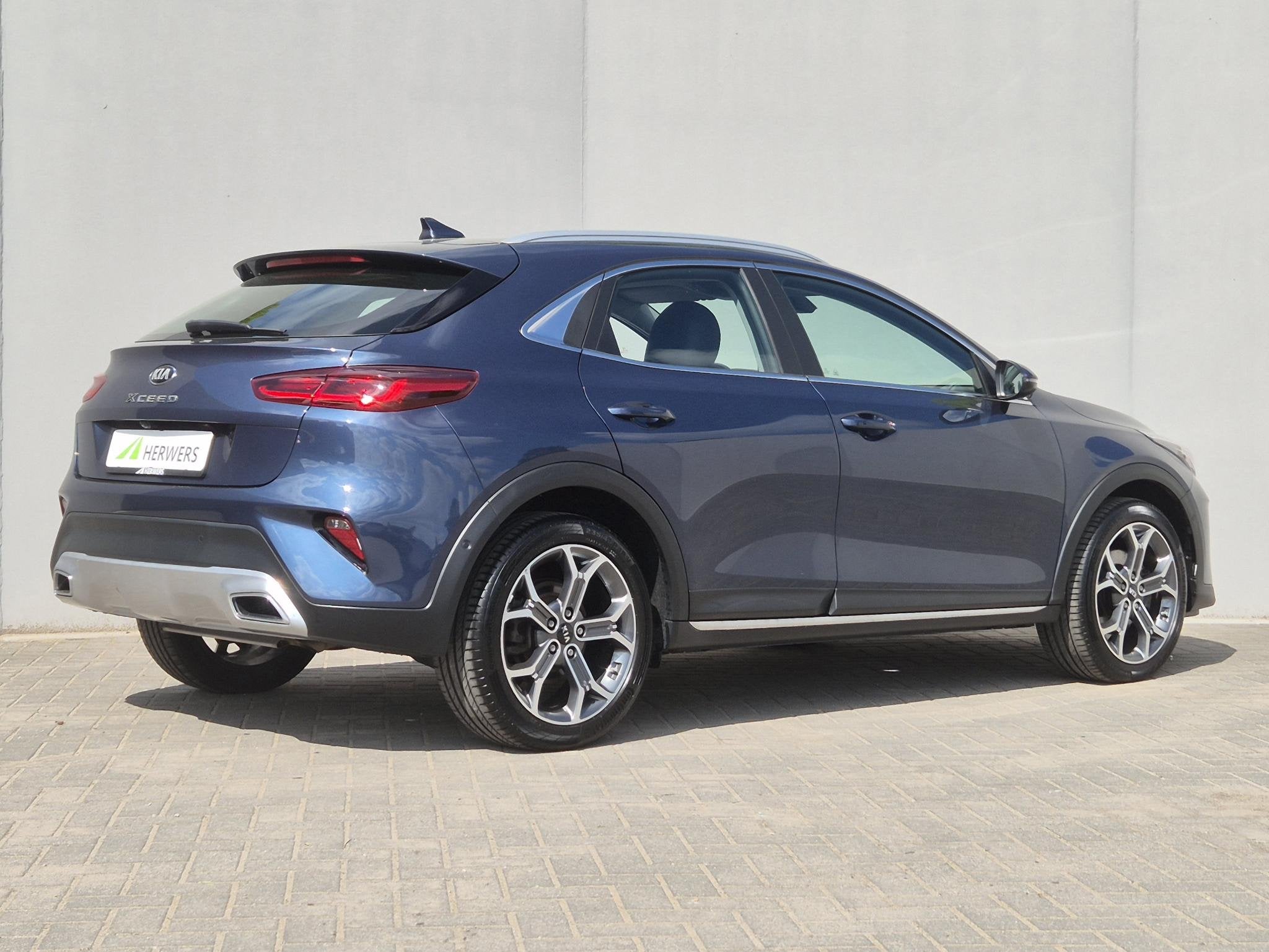 Kia XCeed 1.6 GDi PHEV DynamicPlusLine / Fabrieksgarantie to, Auto's, Kia, XCeed, Gebruikt, Blauw, Leder en Stof