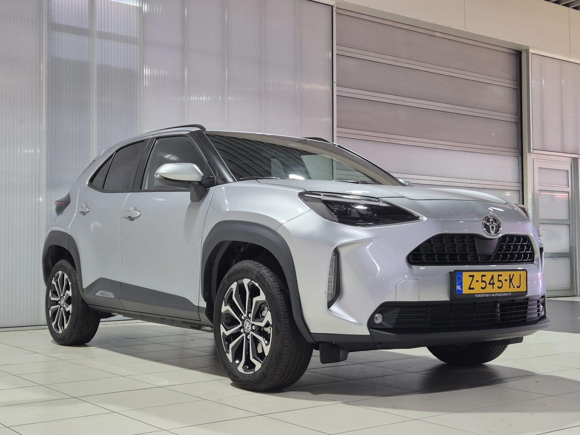 Toyota Yaris Cross 1.5 Hybrid 115 First Edition Automaat , 1, Auto's, Dealer onderhouden, Stof, Gebruikt, 1165 kg