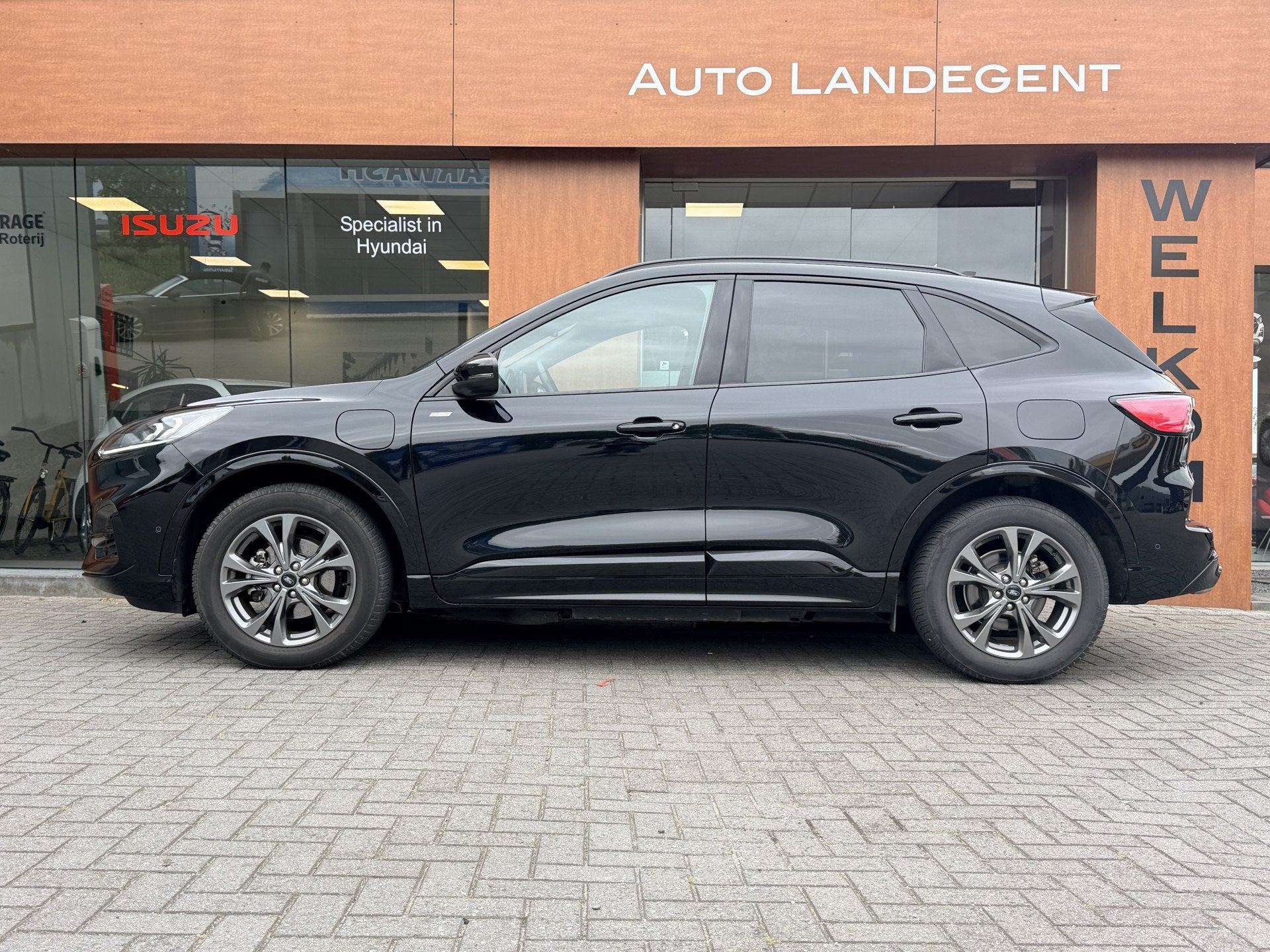 Ford Kuga 2.5 PHEV ST-Line | Carplay | Stoel/ Stuur verwarmi, Auto's, 12 maanden, Gebruikt, 4 cilinders, Zwart