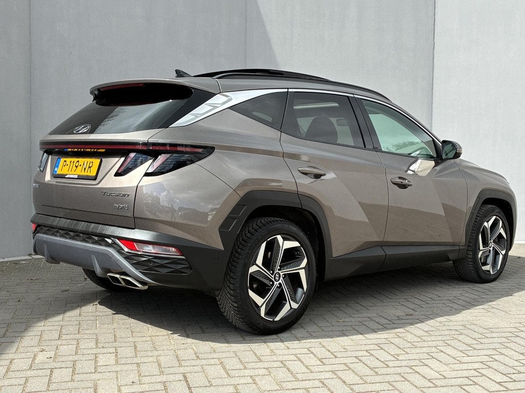 Hyundai Tucson 1.6 T-GDI HEV Premium Sky / NL auto / Schuif/, Gebruikt, Euro 6, 4 cilinders, Bruin