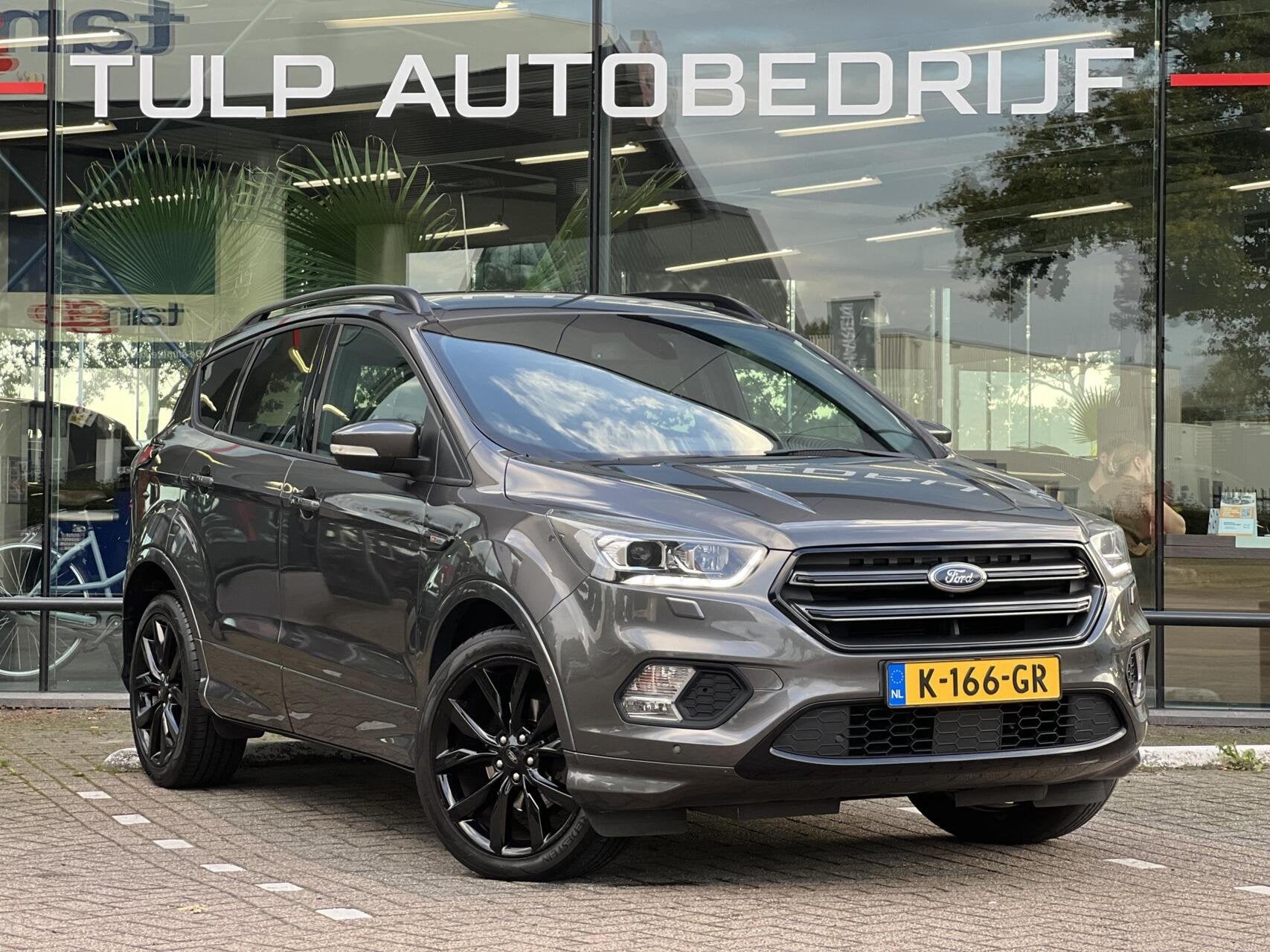 Ford Kuga 1.5 EcoBoost ST Line Clima Cruise Winterpack Trekh, Auto's, Dealer onderhouden, 4 cilinders, Bedrijf, Handgeschakeld