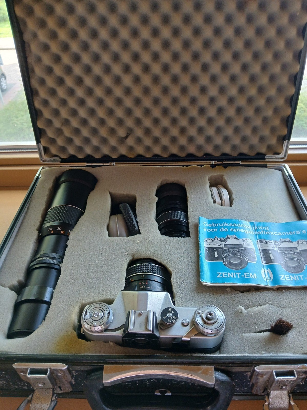 Zenit-E Spiegelreflexcamera met 3 lenzen en koffer, Ophalen of Verzenden