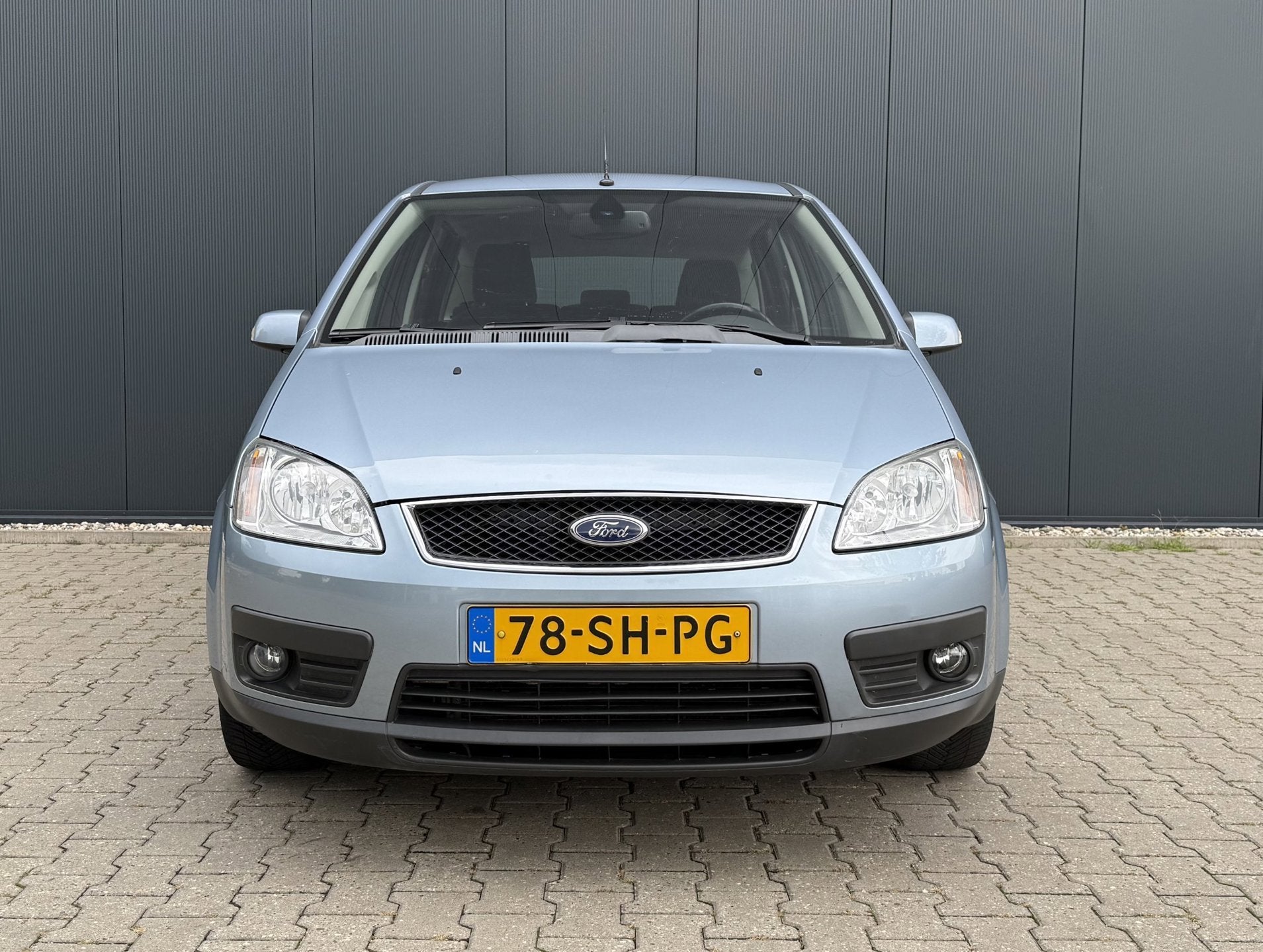 Ford Focus C-Max 2.0-16V Ghia Airco Cruise Navi PDC NAP APK, Stof, Gebruikt, 700 kg, Blauw