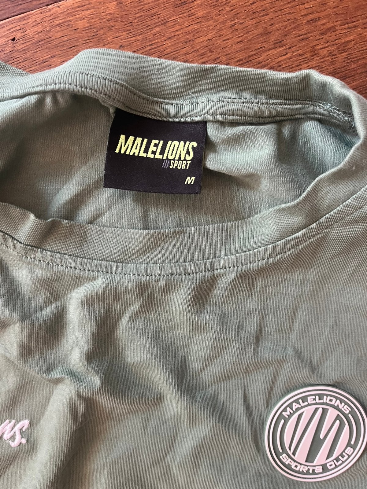 Malelions maat M compleet met broek, Ophalen, Zo goed als nieuw, Zwart