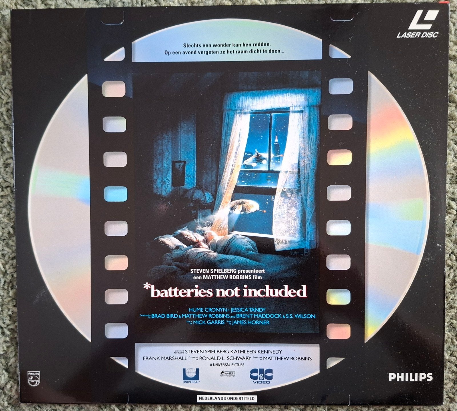 LASERDISC. BATTERIES NOT INCLUDED. STEVEN SPIELBERG., Ophalen of Verzenden, Zo goed als nieuw