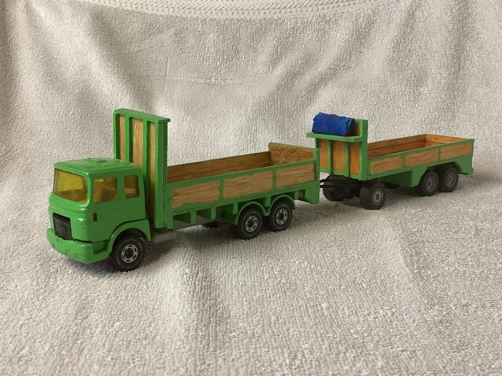 MAN Diesel vrachtwagen met aanhanger met houten luiken, Hobby en Vrije tijd, Modelauto's | 1:50, Ophalen of Verzenden, Zo goed als nieuw