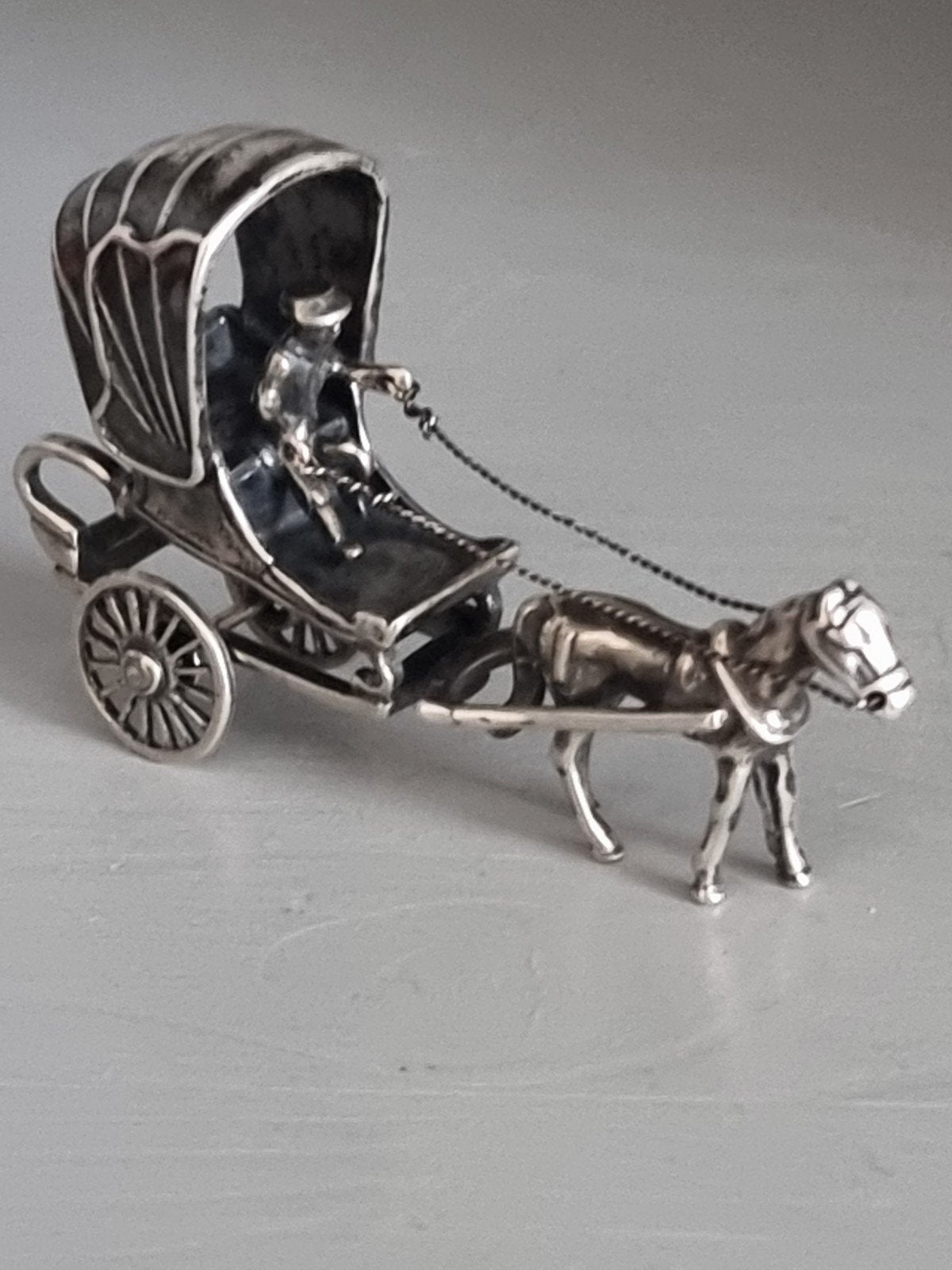 zilveren miniatuur, Verzenden