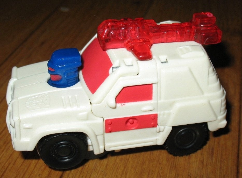 Transformers 2002 mcdonalds wit-rode auto 9x6cm, Verzamelen, Transformers, G1, Ophalen of Verzenden, Gebruikt