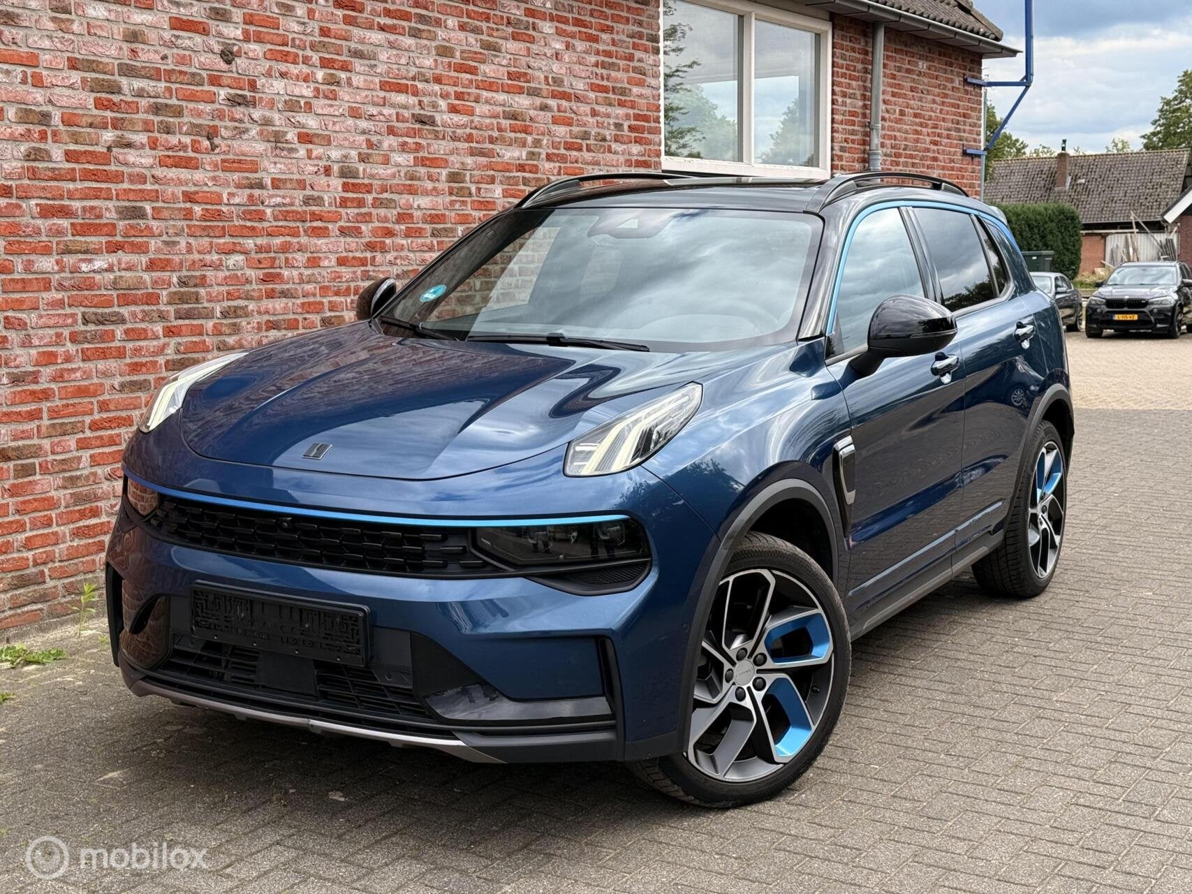 Lynk & Co o1 1.5 360 camera pano dak zw hemel (meerdere), Stof, Gebruikt, Zwart, Overige carrosserieën