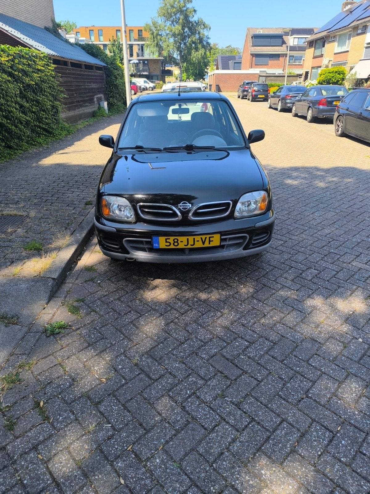 Nissan Micra 1.4 55KW 3D 2002 Zwart, Auto's, Nissan, Voorwielaandrijving, Stof, 750 kg, 4 cilinders