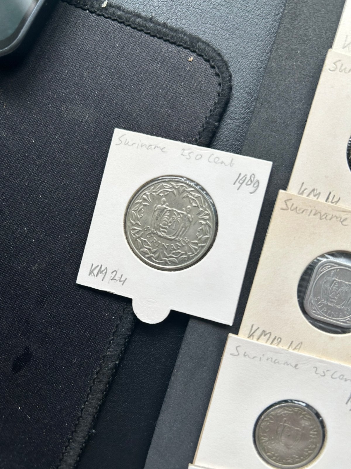 21 Surinaamse munten, Verzenden, Munten