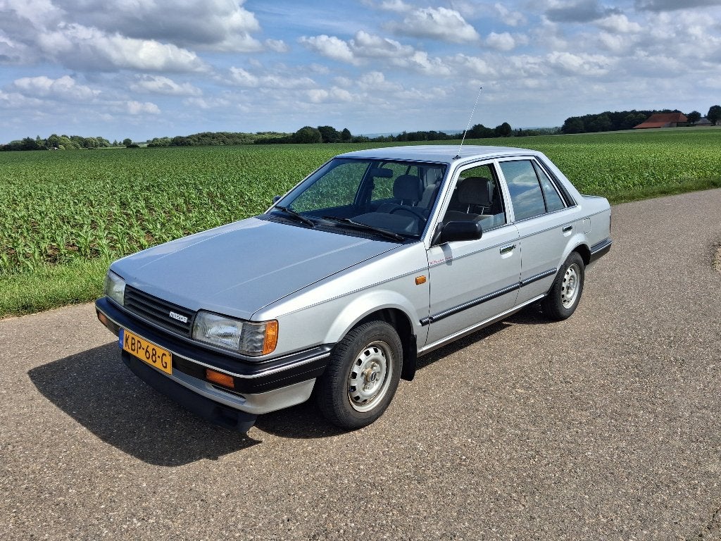 Mazda 323 belastingvrij en 54000 kilometer, 400 kg, 68 pk, Handgeschakeld, 897 kg