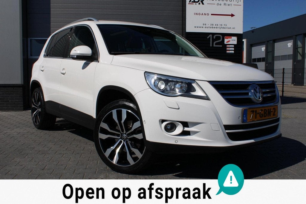 Volkswagen Tiguan 2.0 TSI DSG 4Motion|PANO|LEDER|CAMERA|PDC, Auto's, Automaat, Gebruikt, 1984 cc, Wit