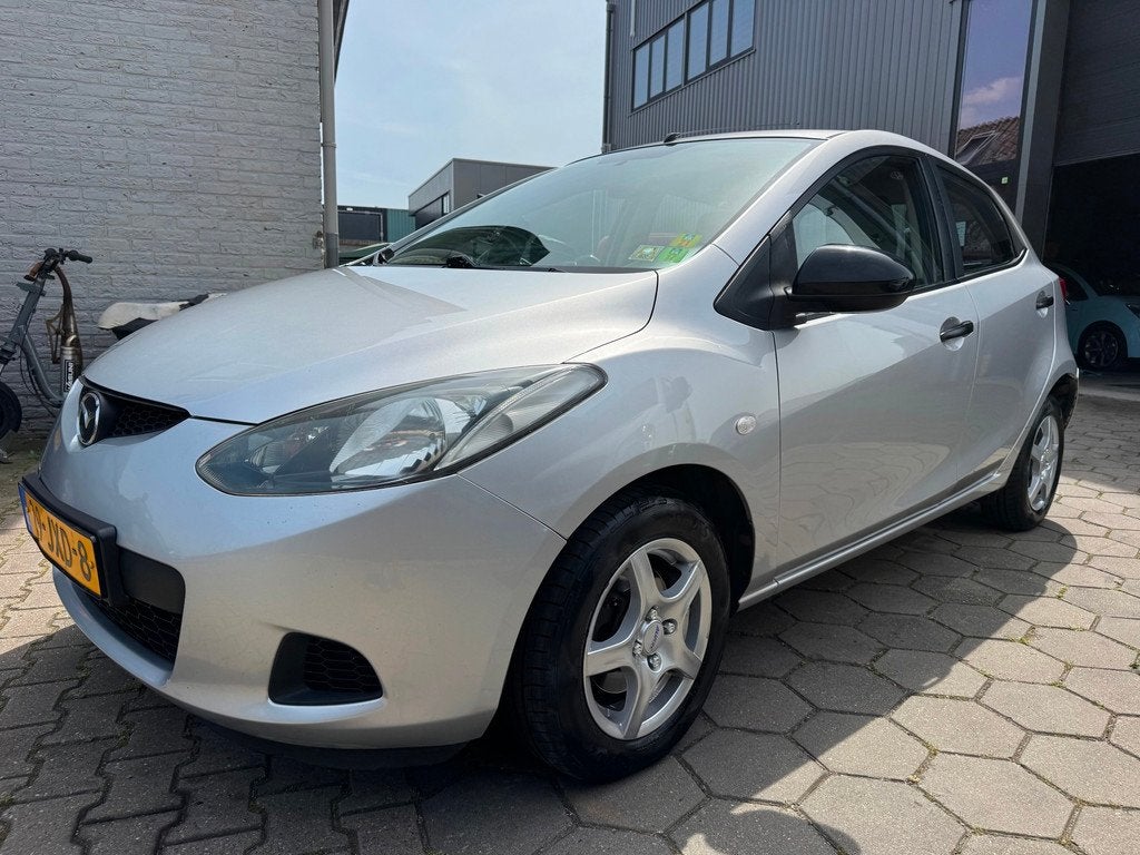 Mazda 2 1.3 S - NW APK - NAVI / CarPlay - Lm Velgen -, Auto's, Mazda, Stof, 4 cilinders, 4 stoelen, Origineel Nederlands