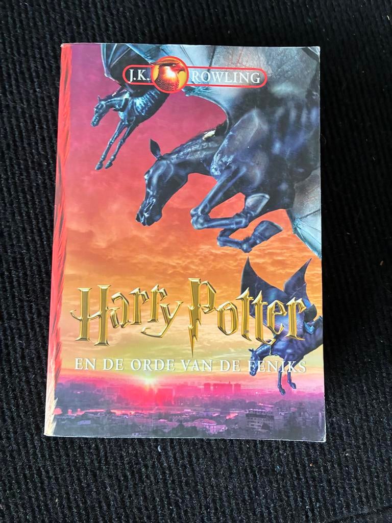 Harry Potter en de Orde van de Feniks - J.K. Rowling, Boeken, Ophalen of Verzenden, Gelezen
