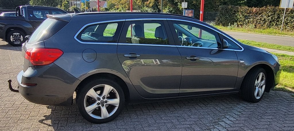 Opel Astra 1.4 Turbo 88KW Sports Tourer 2012 Grijs, Auto's, Voorwielaandrijving, Stof, 4 cilinders, Handgeschakeld