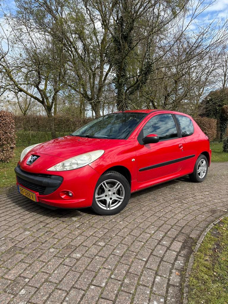 Peugeot 206+ 1.1 3D 2011 Rood, Auto's, Voorwielaandrijving, 206+, 31 €/maand, 4 cilinders