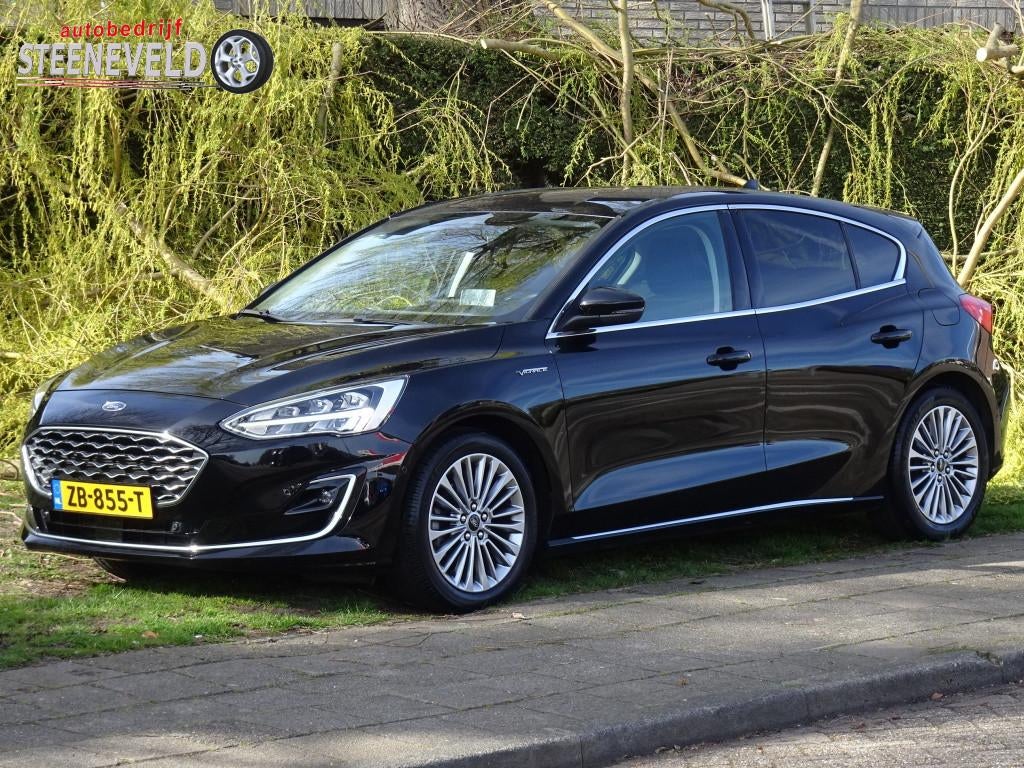 Ford Focus 1.0 125pk Vignale met Head-Up, Leer en Camera, Auto's, Ford, 125 pk, Euro 6, Zwart, Bedrijf