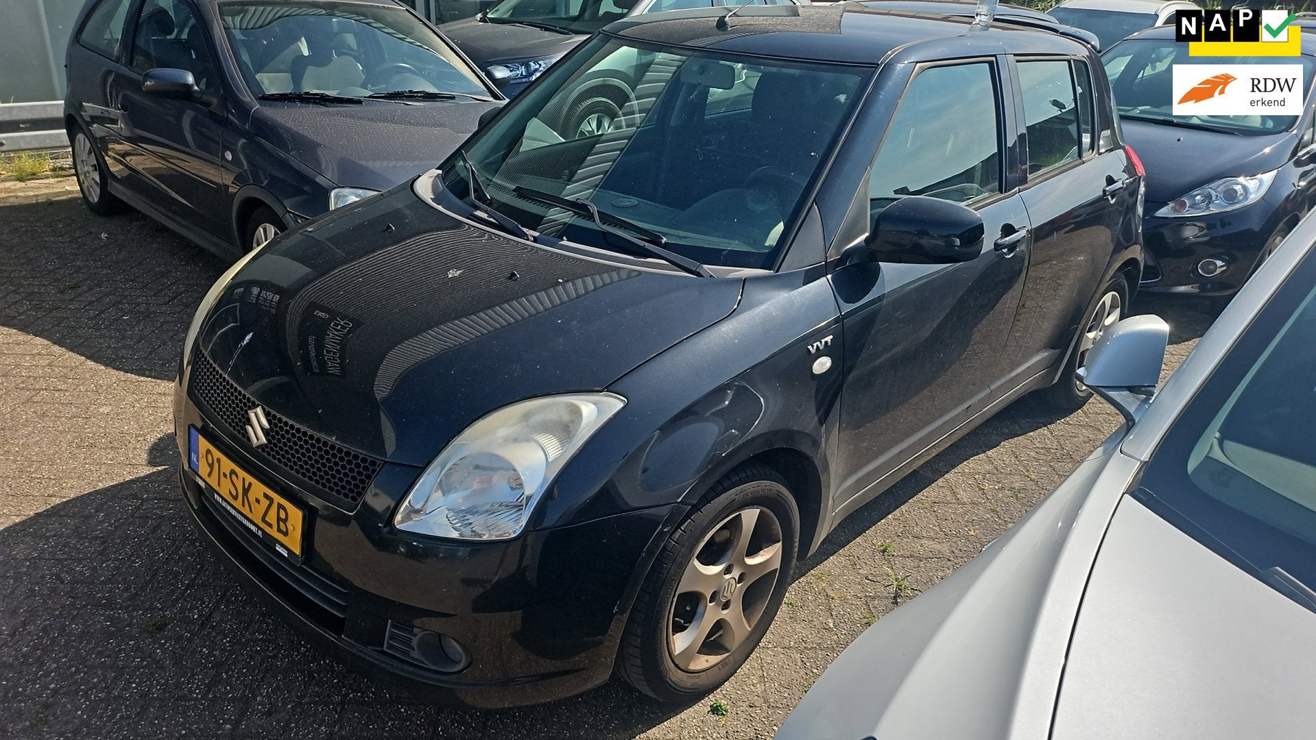 Suzuki Swift 1.5 Exclusive 5-deurs Airco LM-Velgen Zwart Key, Auto's, Suzuki, Voorwielaandrijving, Zwart, 4 cilinders, Automatische klimaatregeling
