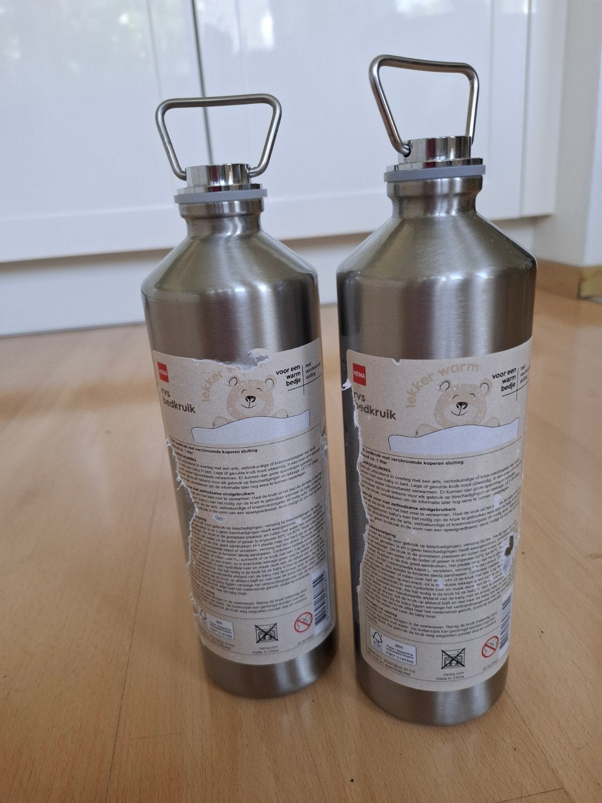 2 rvs Hema kruiken met verschillende kruikenzakken, Ophalen of Verzenden, Overige typen, Hema