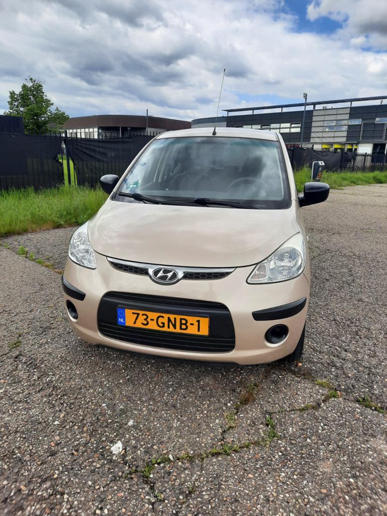 Hyundai i10 1.1I 5DR AUT 2008 Beige, Auto's, Stof, 4 cilinders, Elektrische ramen, Beige