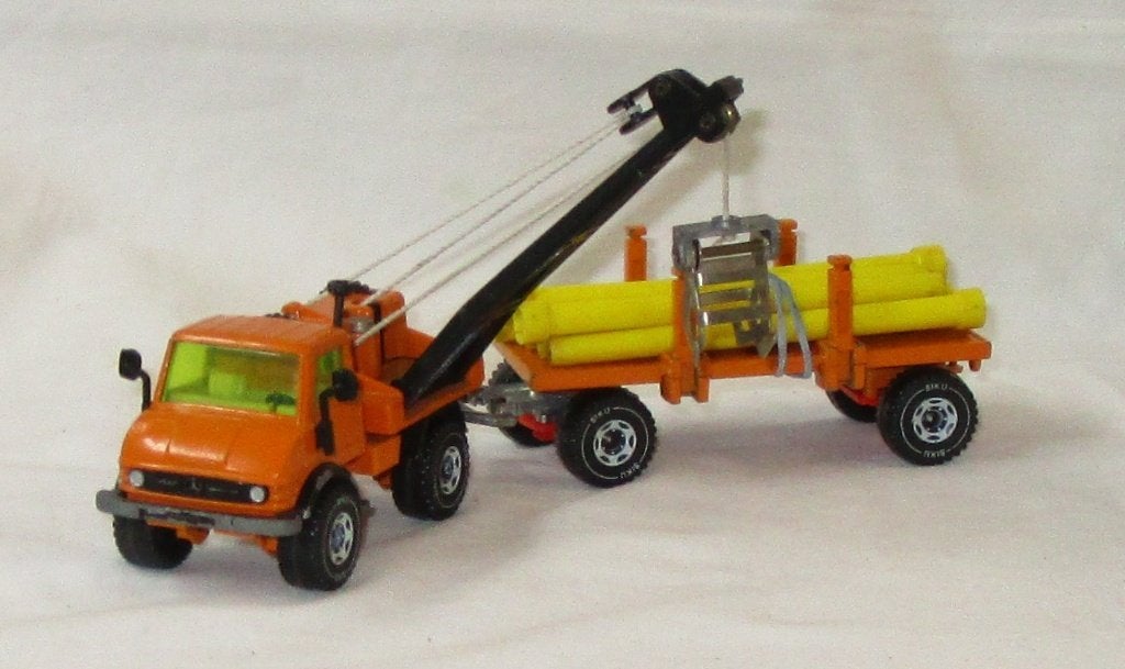 Siku 2820 Unimog Pipelayer with Trailer, Ophalen of Verzenden, Gebruikt, Bus of Vrachtwagen, SIKU