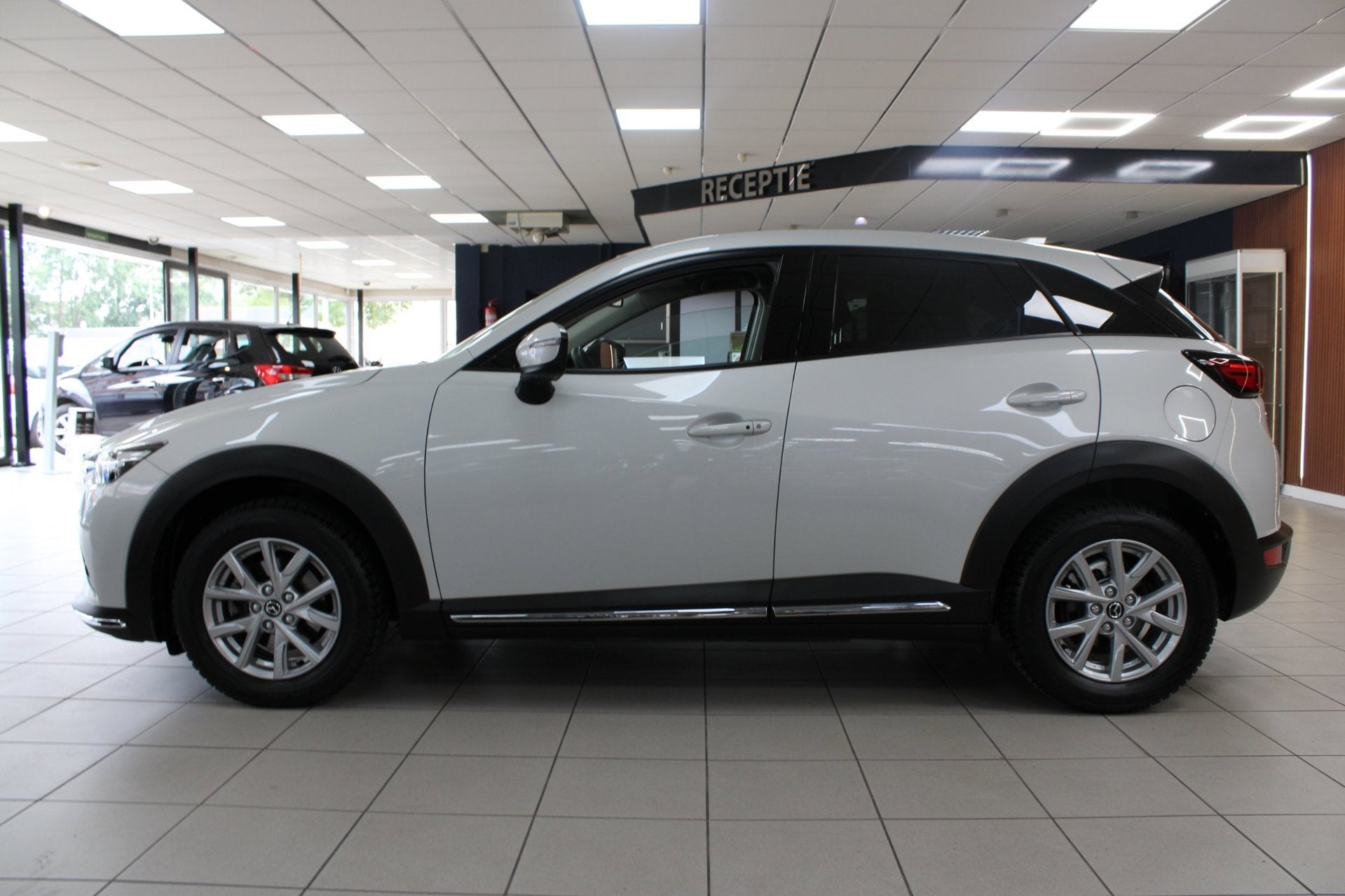 Mazda CX-3 2.0 SkyActiv-G 121 Comfort Automaat | Adaptieve C, Auto's, Gebruikt, 4 cilinders, Wit, Leder