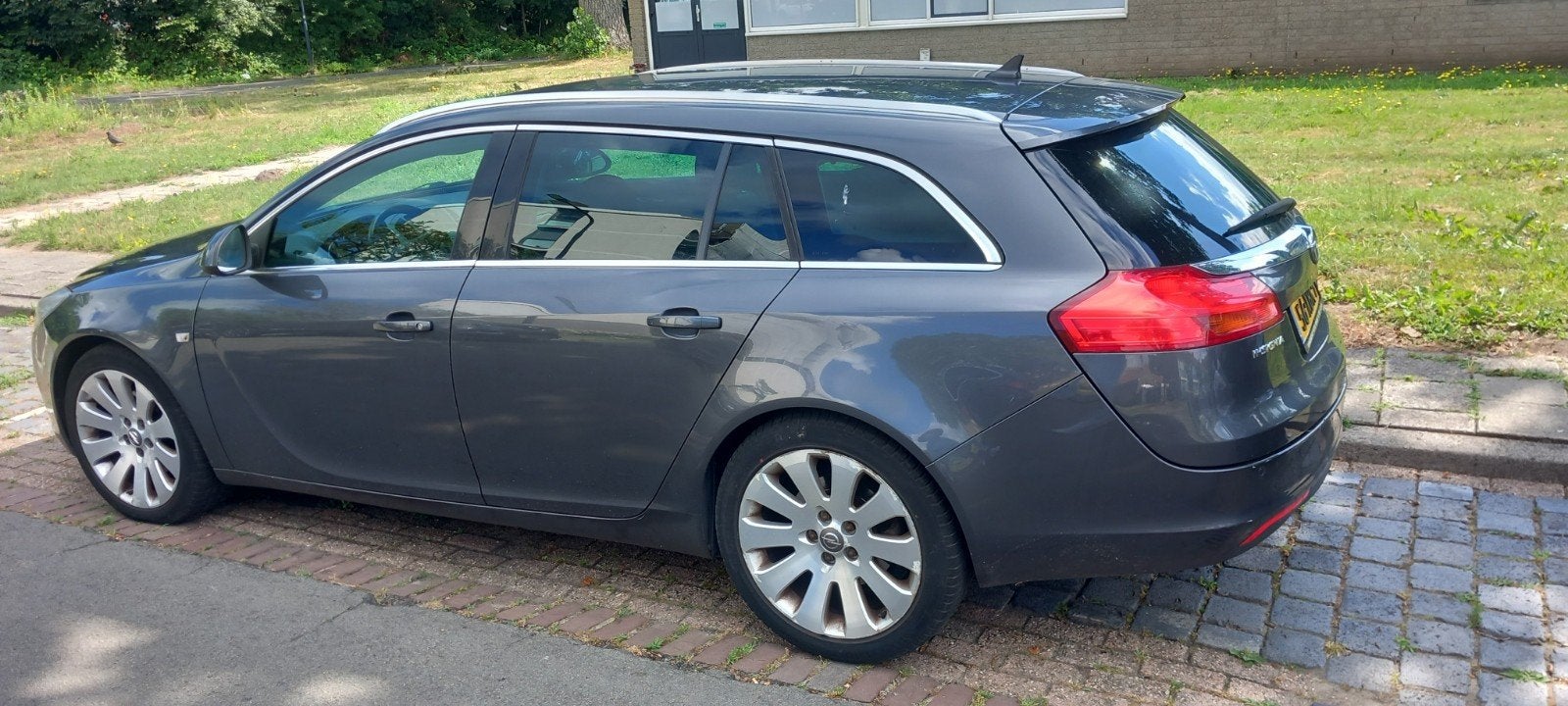 Opel Insignia 1.4 Turbo 103KW Sports Tourer 2012 Grijs, Auto's, Stof, 4 cilinders, Origineel Nederlands, Handgeschakeld