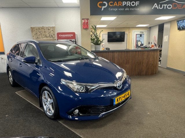 Toyota Auris 1.8 Hybrid Lease Pro (bj 2018, automaat), Auto's, 12 maanden, Gebruikt, Blauw, Hybride Elektrisch/Benzine