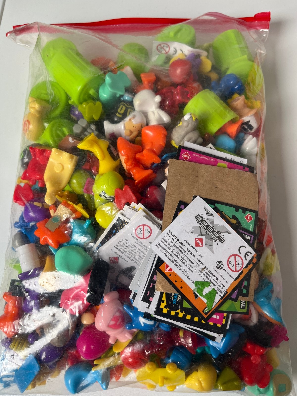 Grote zak vol Gogo's / Crazy Bones met kaarten, Ophalen of Verzenden, Zo goed als nieuw