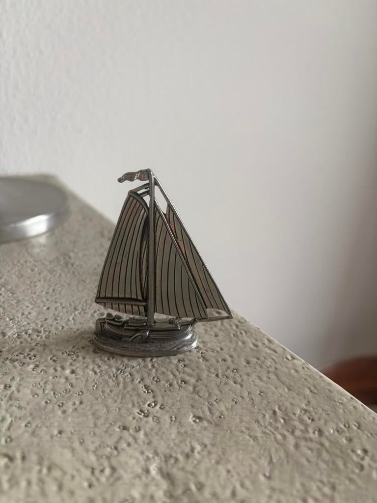 Tinnen boot, Ophalen