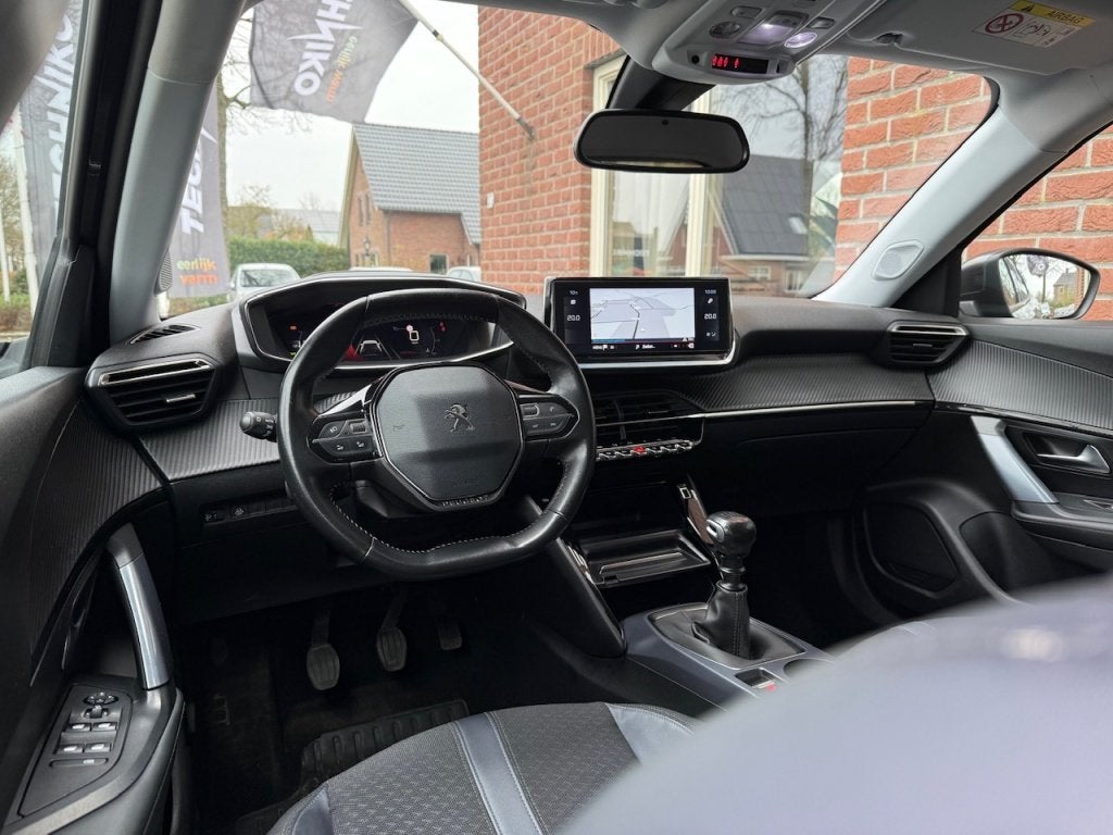 Peugeot 2008 1.2 PureTech Allure VIRTUAL.COCKPIT / HALF.LEER, Auto's, 1163 kg, Gebruikt, 1199 cc, Leder en Stof