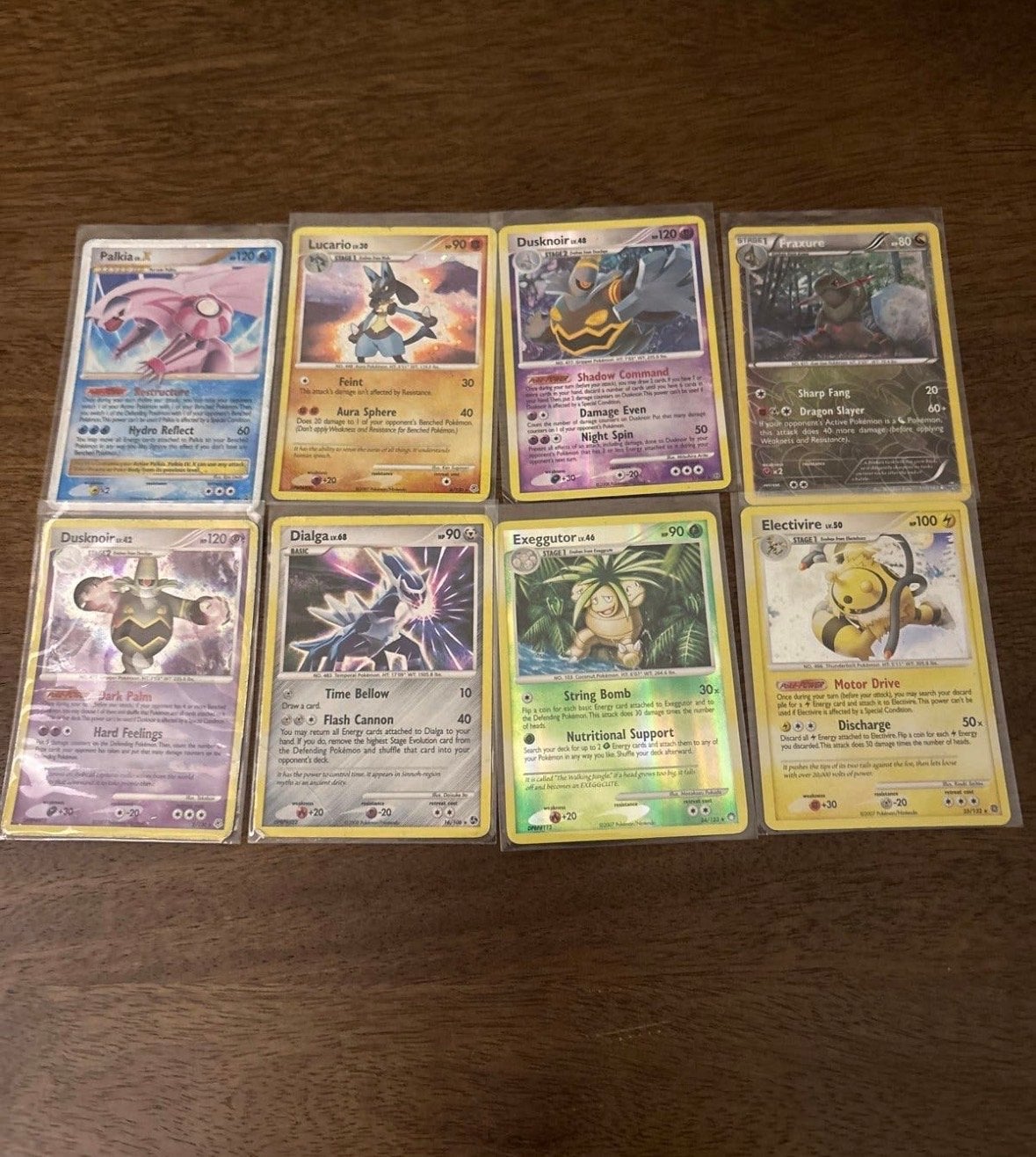 8 zeer nette LV en LV x Pokémon kaarten, Ophalen of Verzenden, Zo goed als nieuw, Meerdere kaarten, Foil