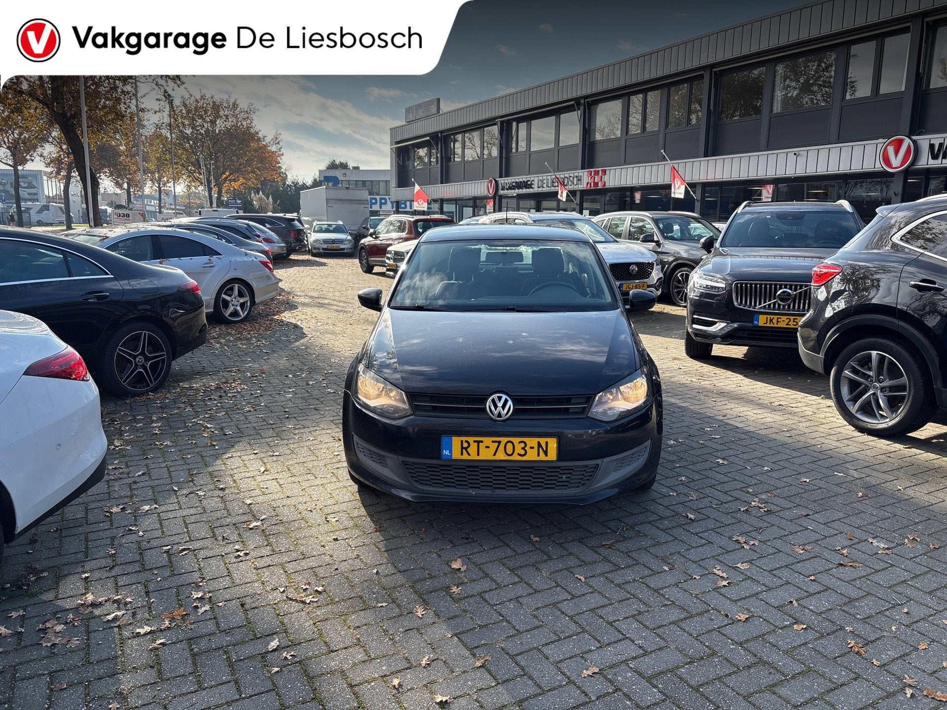 Volkswagen Polo 1.2-12V Comfortline/airco/navi/pdc/boeken/5, Auto's, Voorwielaandrijving, Euro 5, 1198 cc, Zwart