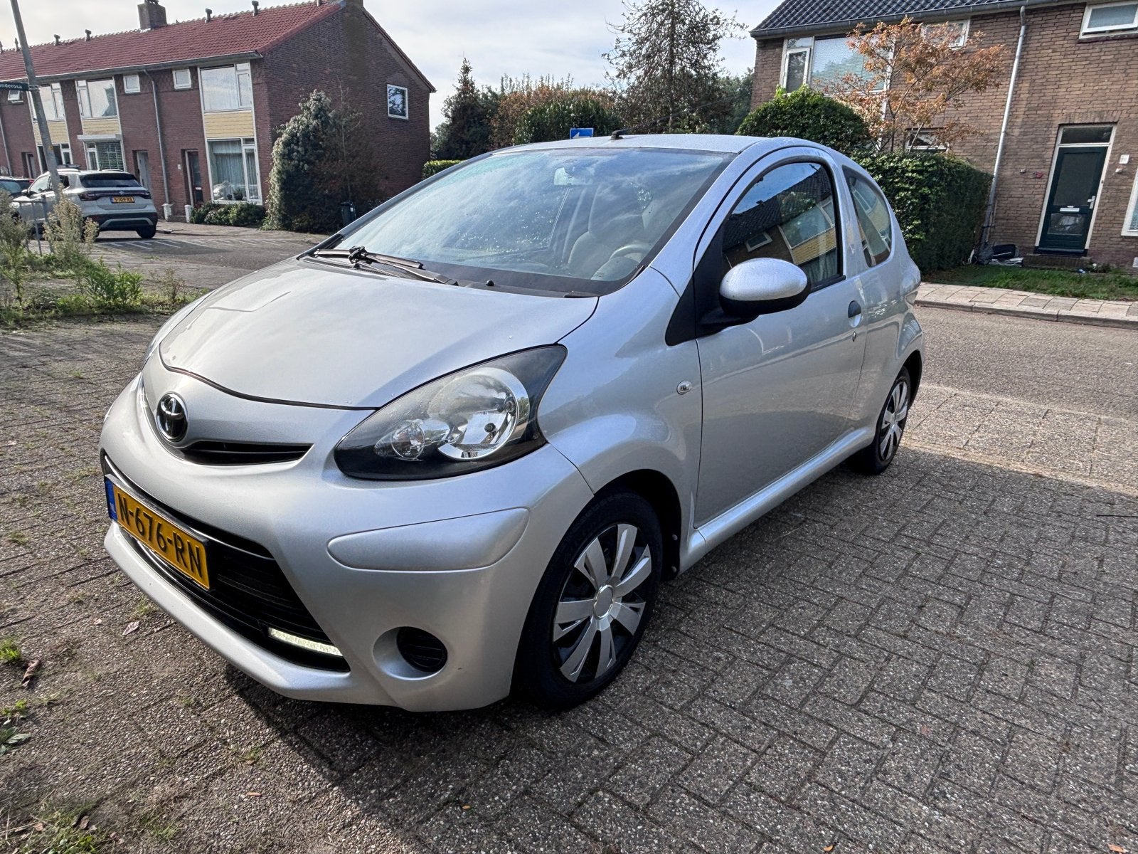 Toyota Aygo 1.0 12V Vvt-i 3DRS MMT 2012 Grijs, Voorwielaandrijving, Stof, 4 stoelen, Bedrijf