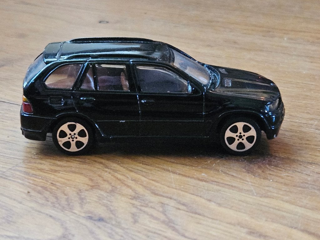 Burago BMW X5 Schaalmodel 1/43 - Zwart, Ophalen of Verzenden, Gebruikt, Auto, Overige merken