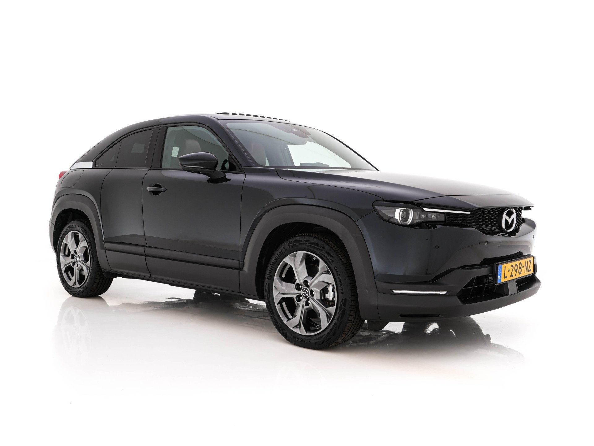 Mazda MX-30 e-SkyActiv 145 Luxury 36 kWh (INCL-BTW) *PANO |, Auto's, Mazda, Gebruikt, Zwart, 35 kWh, Leder en Stof