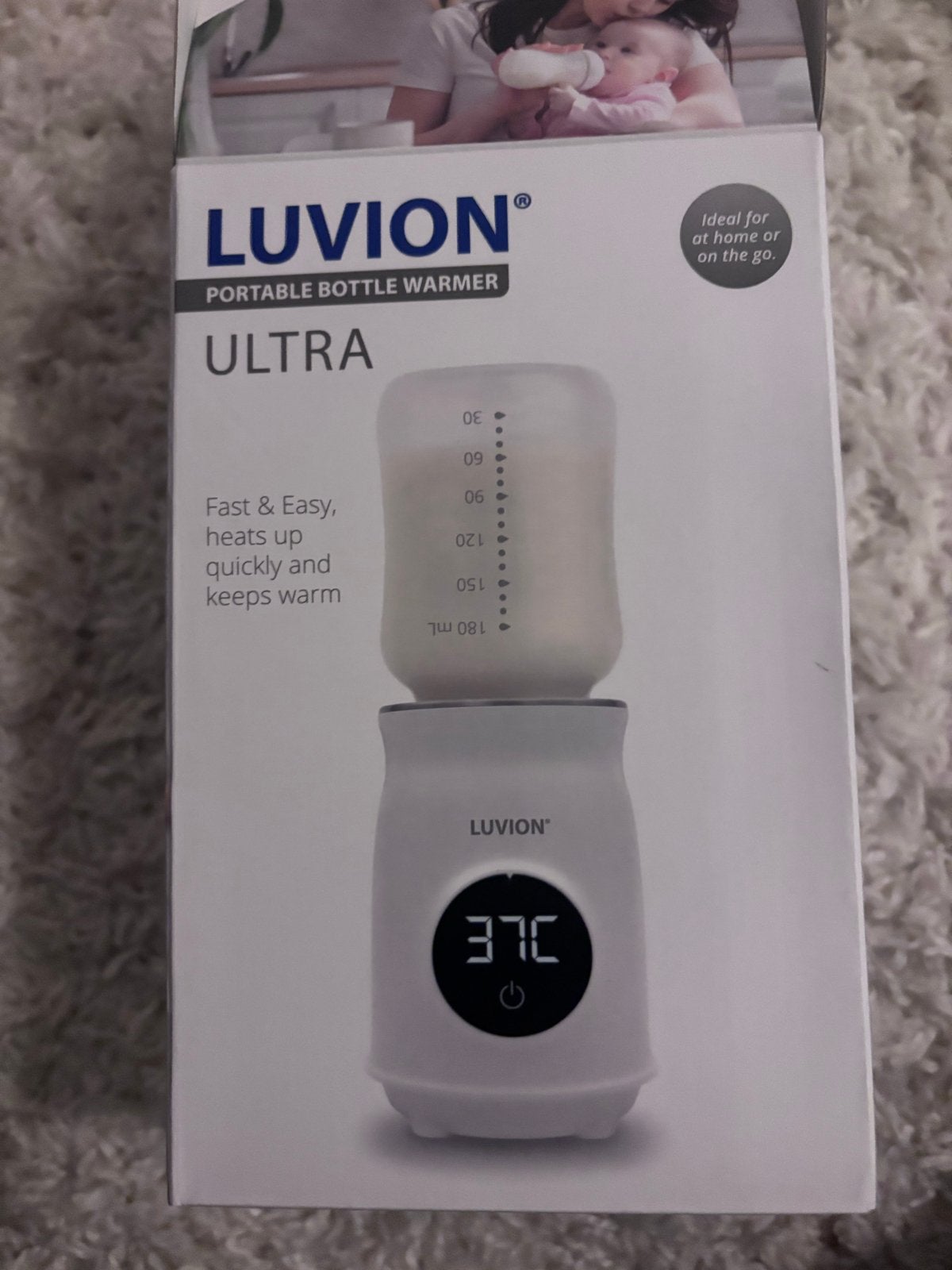 Portable bottle warmer - Luvion Ultra Flessenwarmer, Flessen- of potjesverwarmer, Luvion, Ophalen of Verzenden, Zo goed als nieuw
