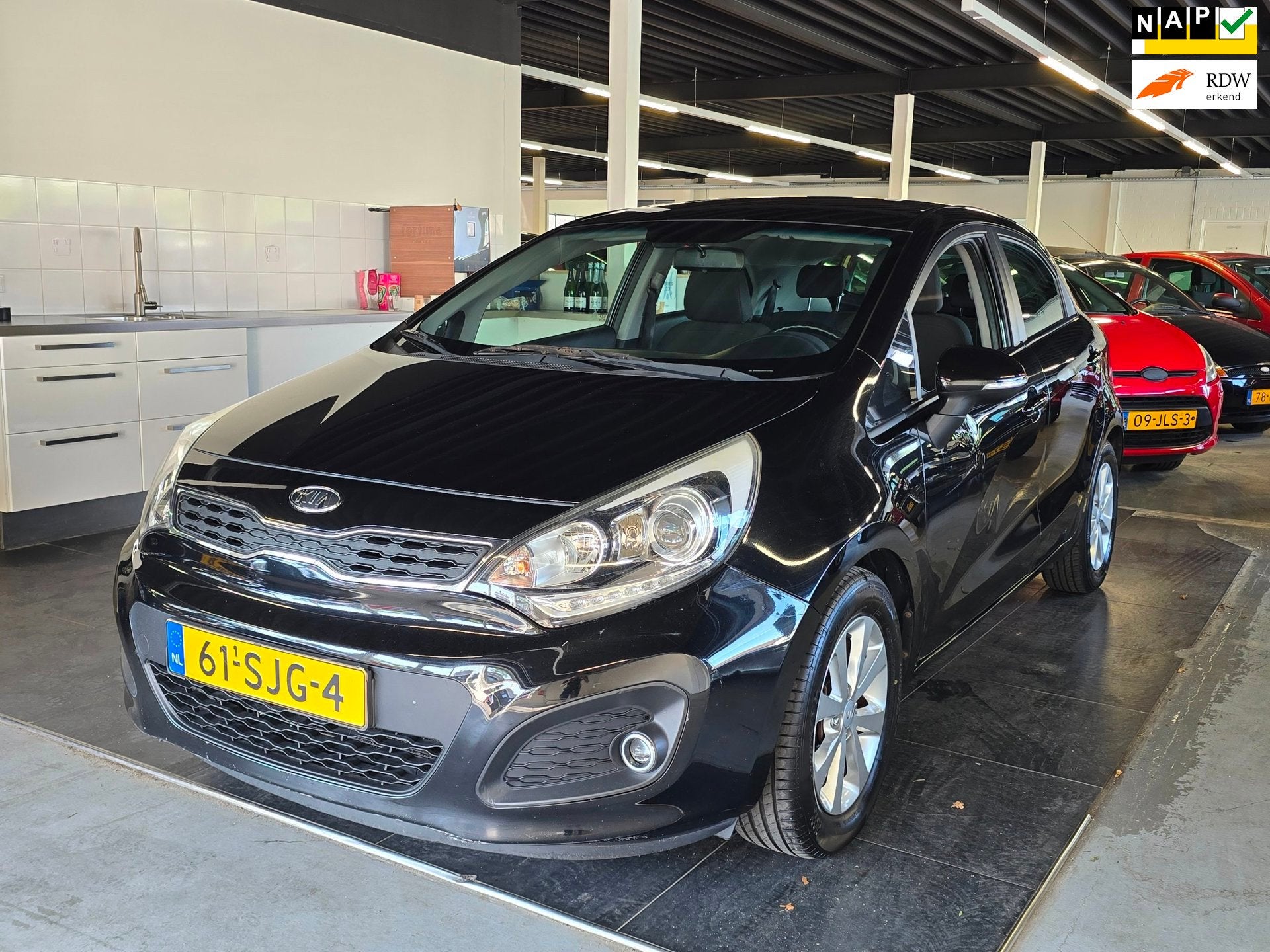 Kia Rio 1.2 CVVT Super Pack/AIRCO/CRUISE/BOEKJES/, Euro 5, Zwart, 4 cilinders, Zwart