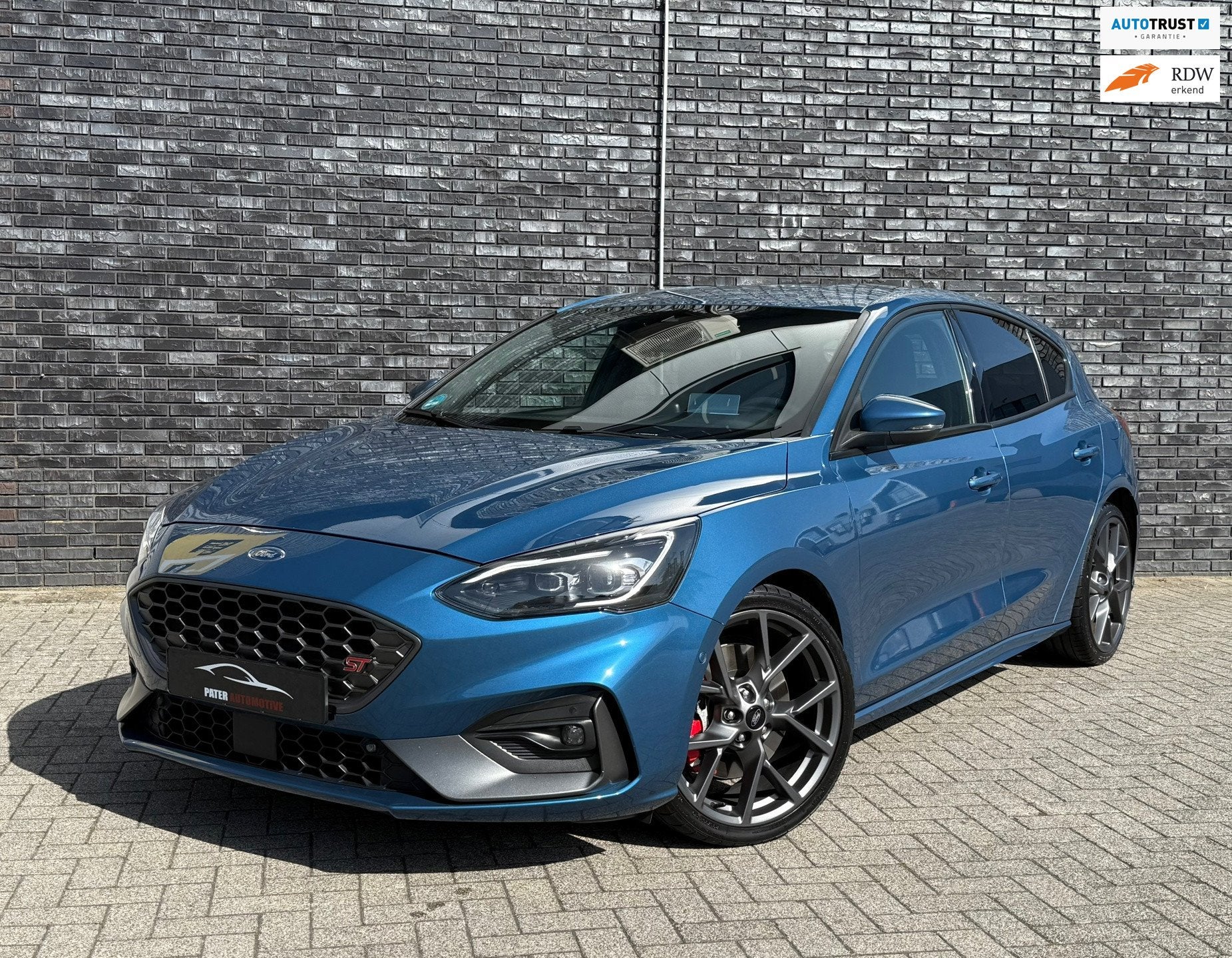 Ford Focus 2.3 EcoBoost ST-3 Automaat|Camera|HUD|B&O|El. Sto, Auto's, Gebruikt, 4 cilinders, Met garantie (alle), Blauw