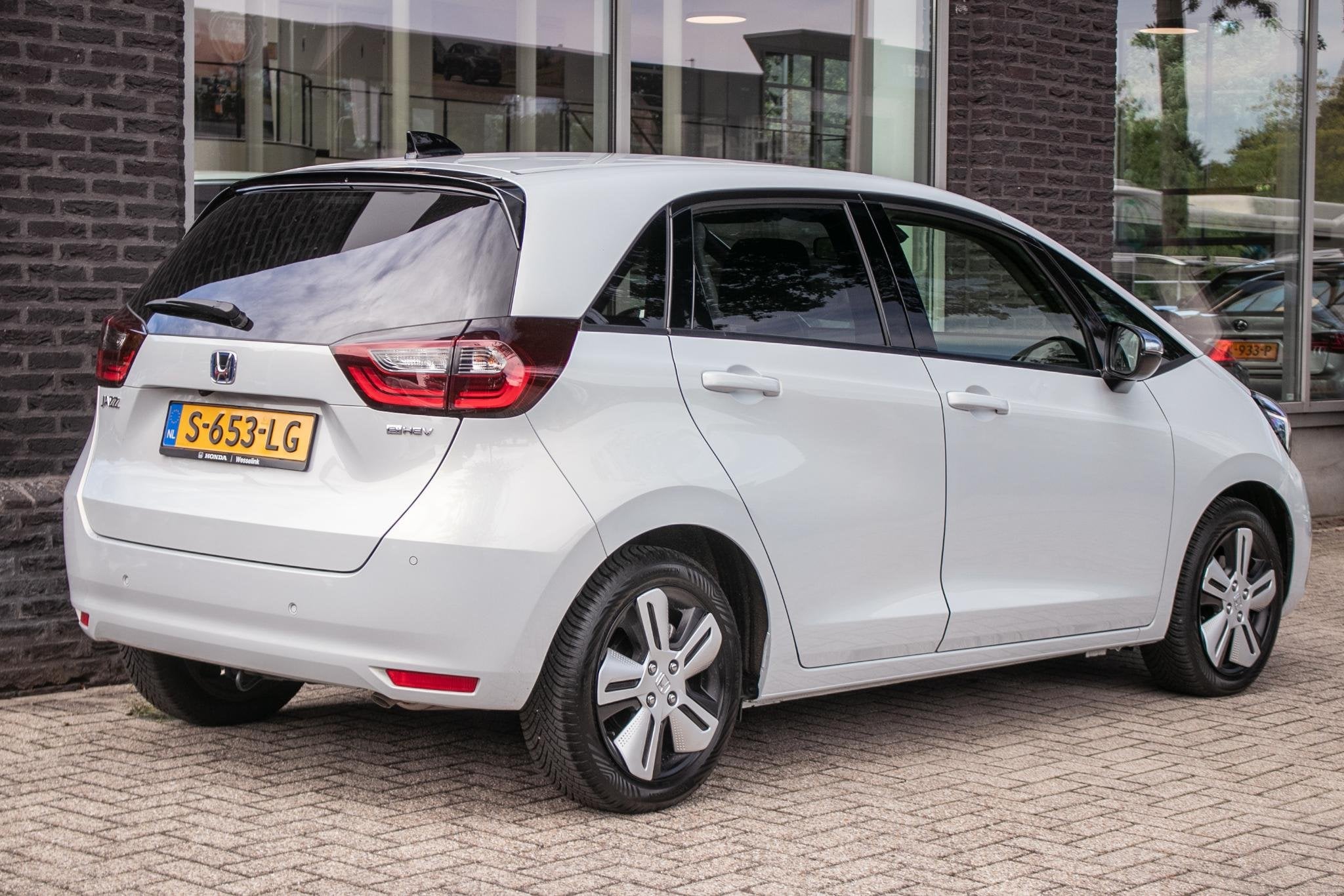 Honda Jazz 1.5 e:HEV Executive | All Season banden | Camerra, Auto's, Honda, Dealer onderhouden, Euro 6, Leder en Stof, Wit