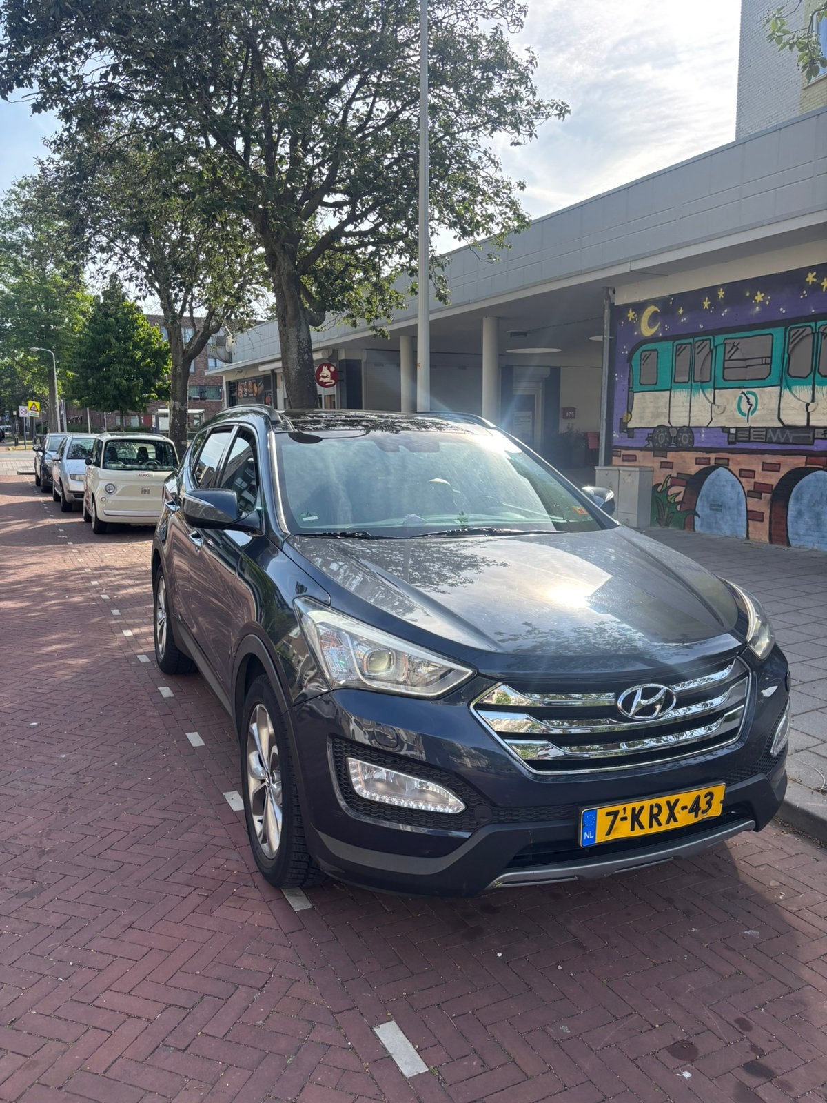 Hyundai Santa Fe 2.2 Crdi  AUT 7p nieuw Apk, Auto's, Hyundai, 2000 kg, Blauw, 7 stoelen, Bruin